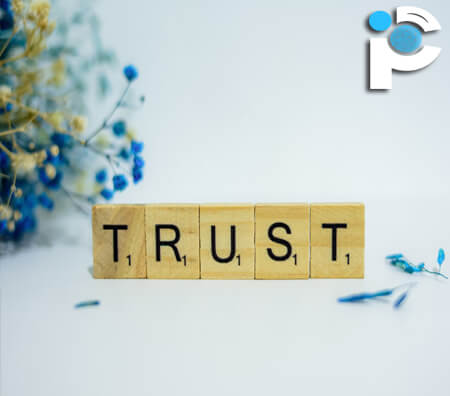 The word trust made with scrabble letters