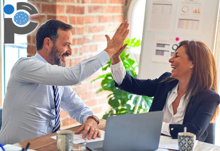 Business people giving each other a high five