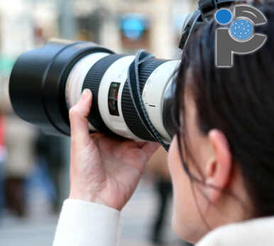 Detective taking photos with a DSLR camera