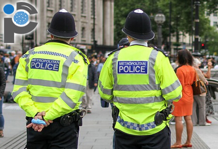 Metropolitan police officers outside wearing high vis jackets